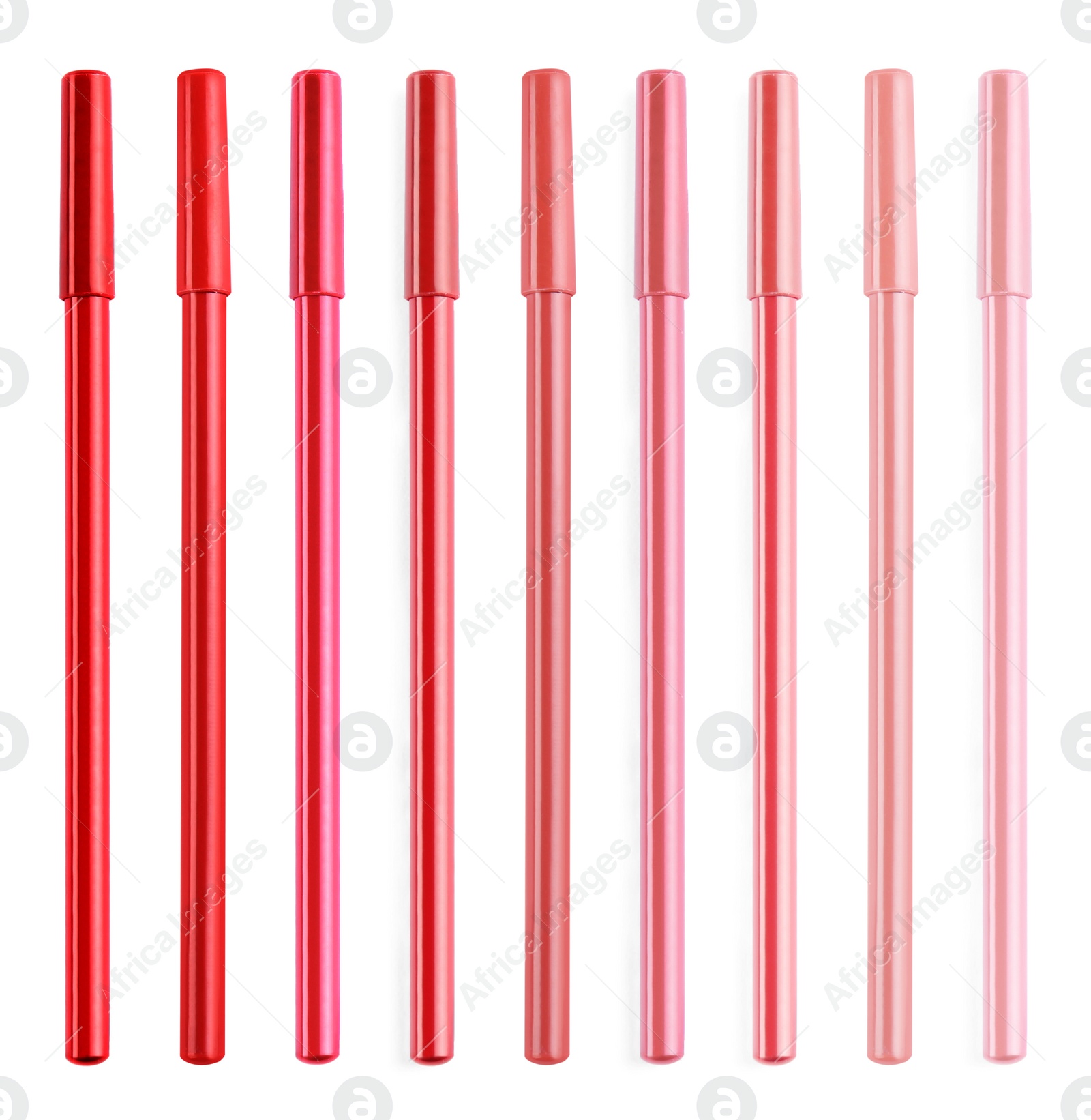 Image of Set with lip pencils of different shades on white background. Decorative cosmetics