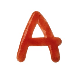 Photo of Letter A written with red sauce on white background