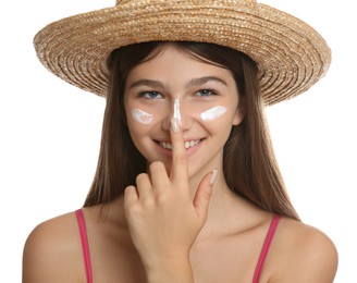 Photo of Teenage girl with sun protection cream on her face against white background