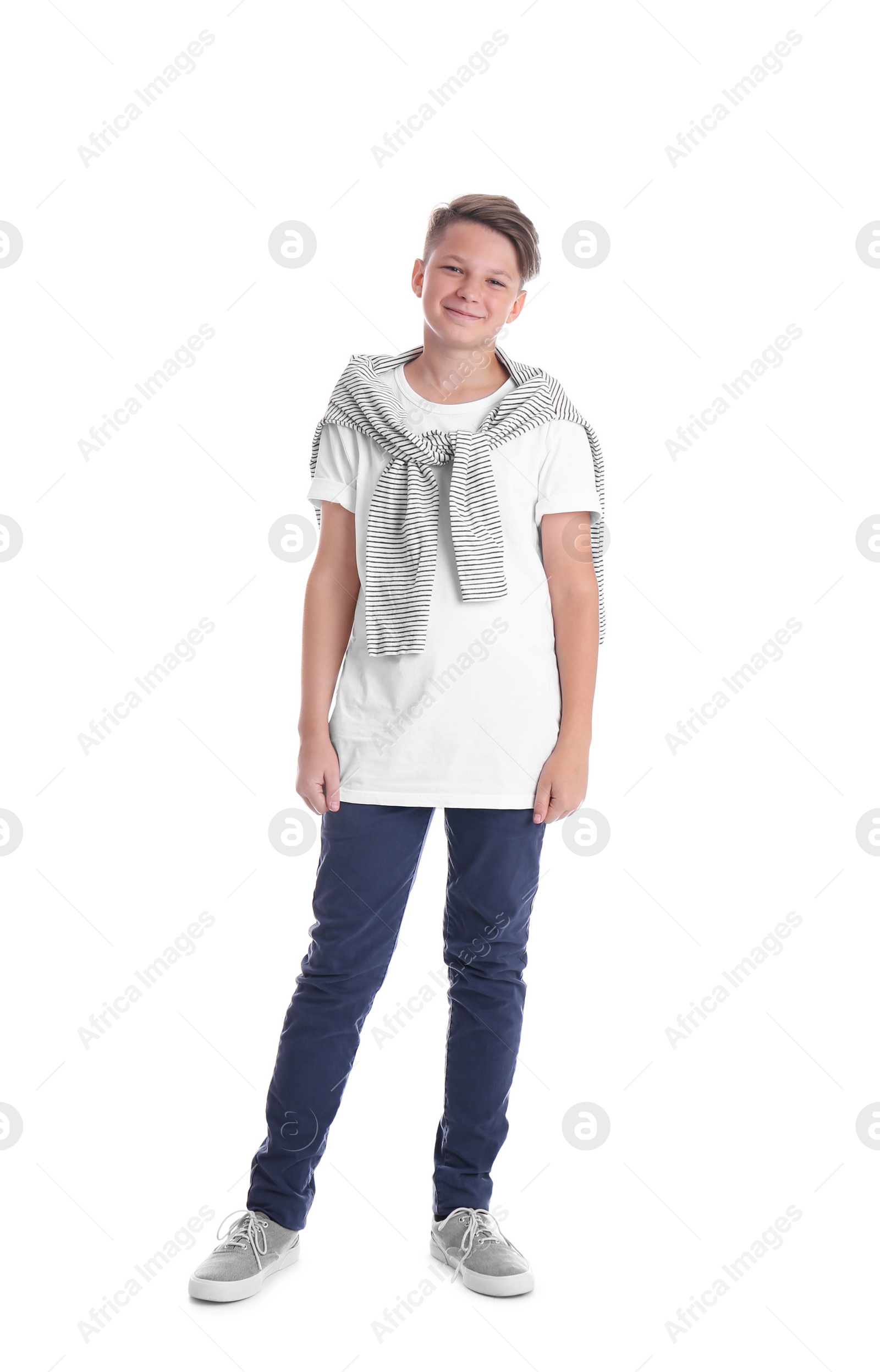 Photo of Teenage boy in casual clothes on white background