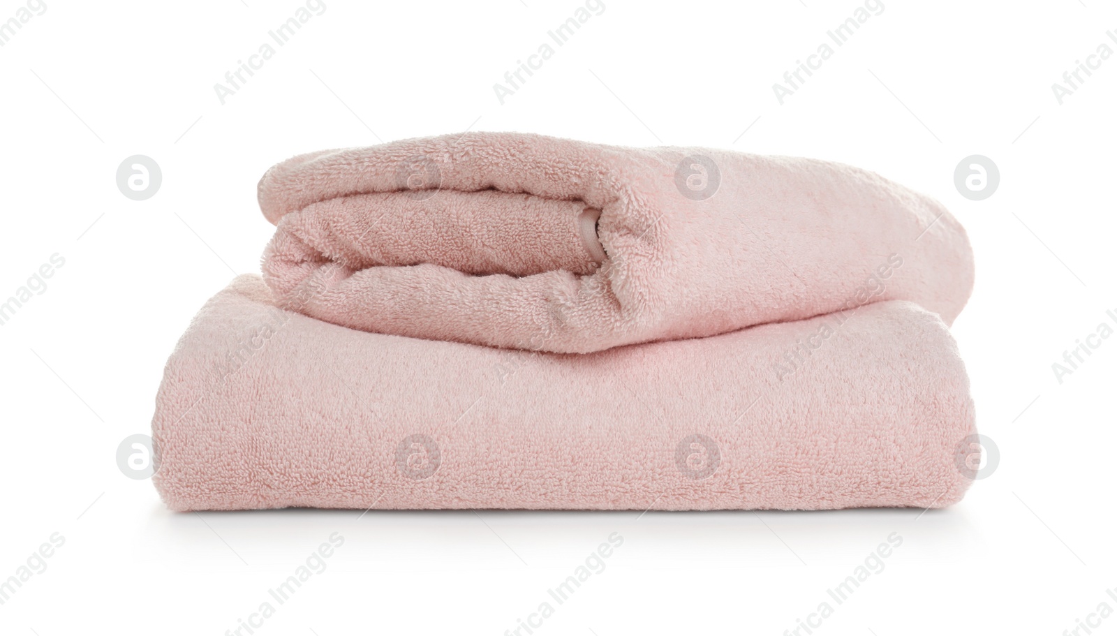 Photo of Folded clean soft towels on white background