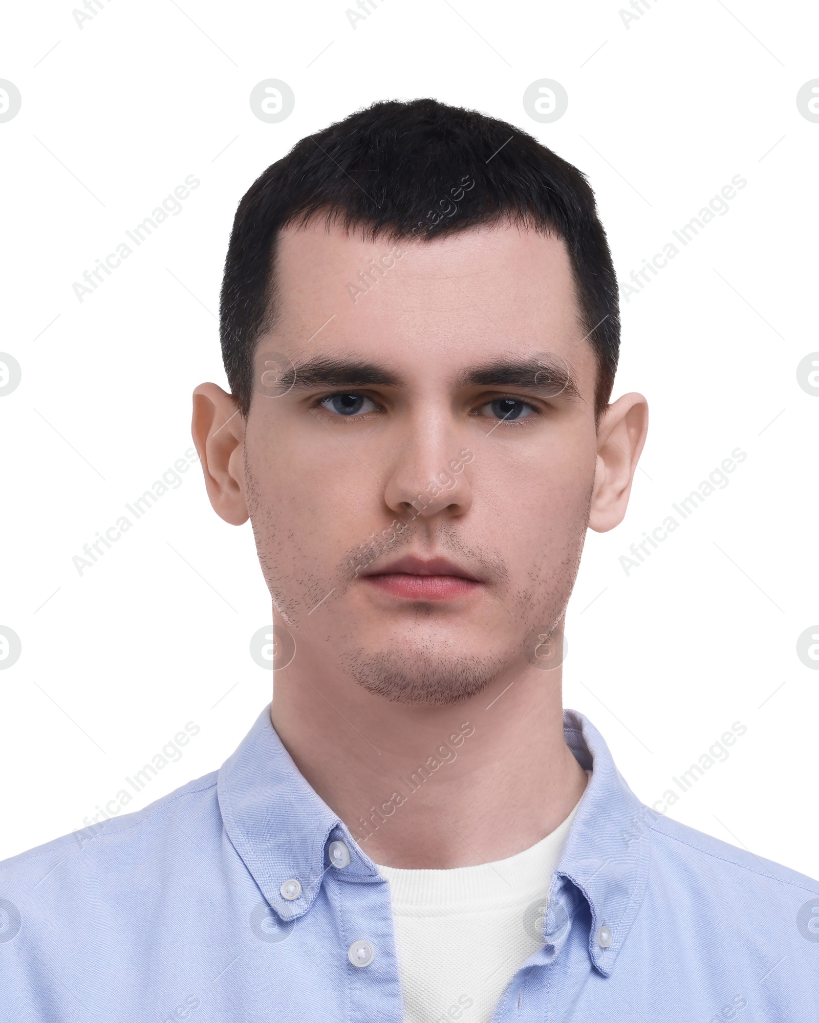 Image of Passport photo. Portrait of young man on white background