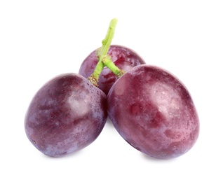 Fresh ripe juicy pink grapes isolated on white