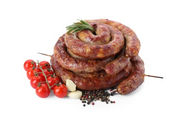Photo of Rings of delicious homemade sausage with spices and tomatoes isolated on white