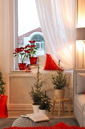 Photo of Living room with Christmas decorations. Festive interior design