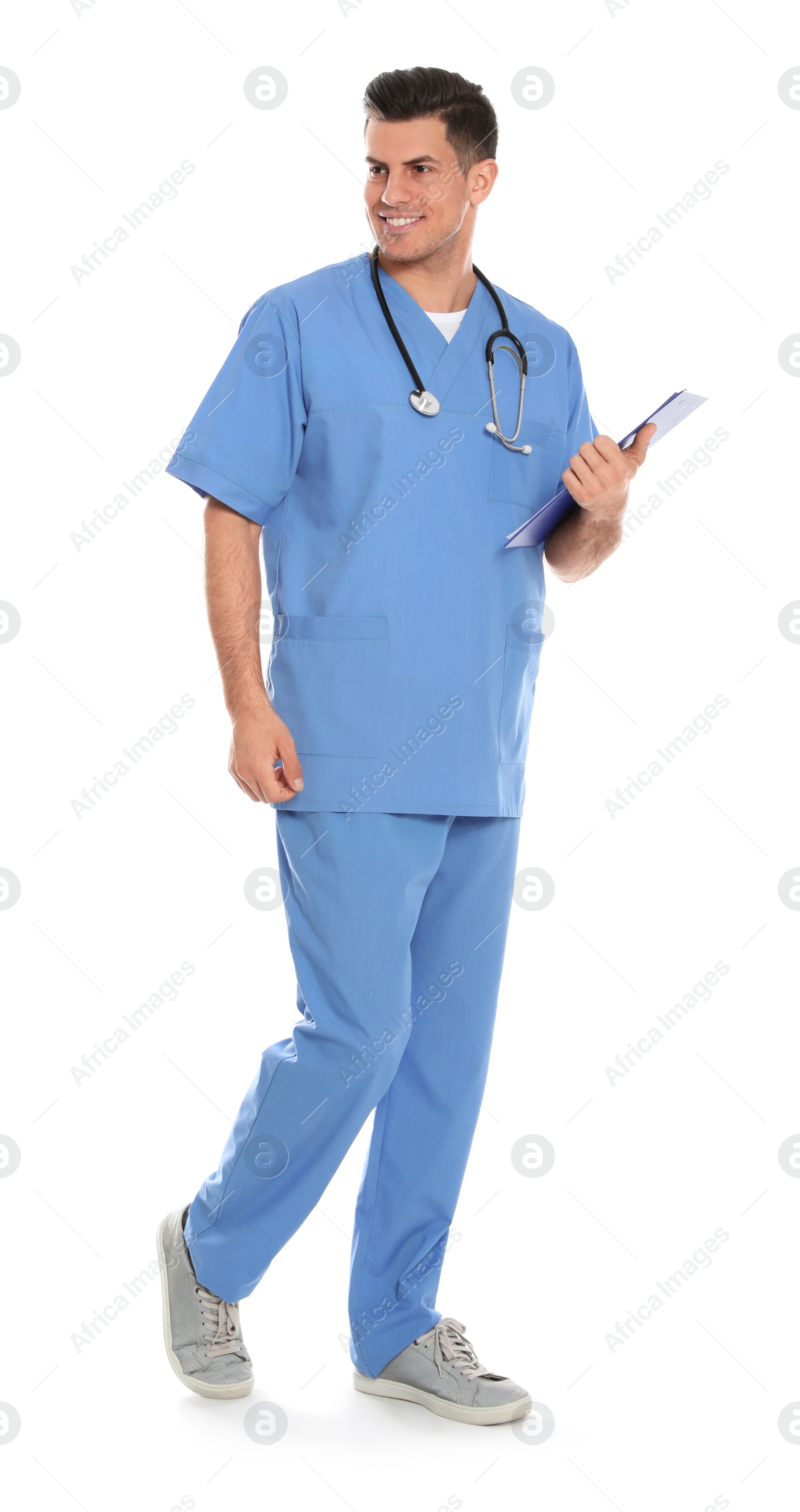 Photo of Full length portrait of medical doctor with clipboard and stethoscope isolated on white