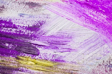 Image of Strokes of colorful acrylic paints on white canvas, closeup