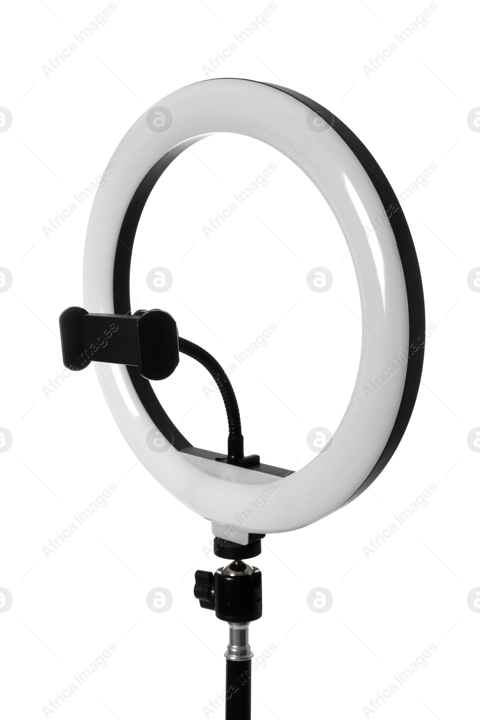 Photo of Modern ring light on stand against white background