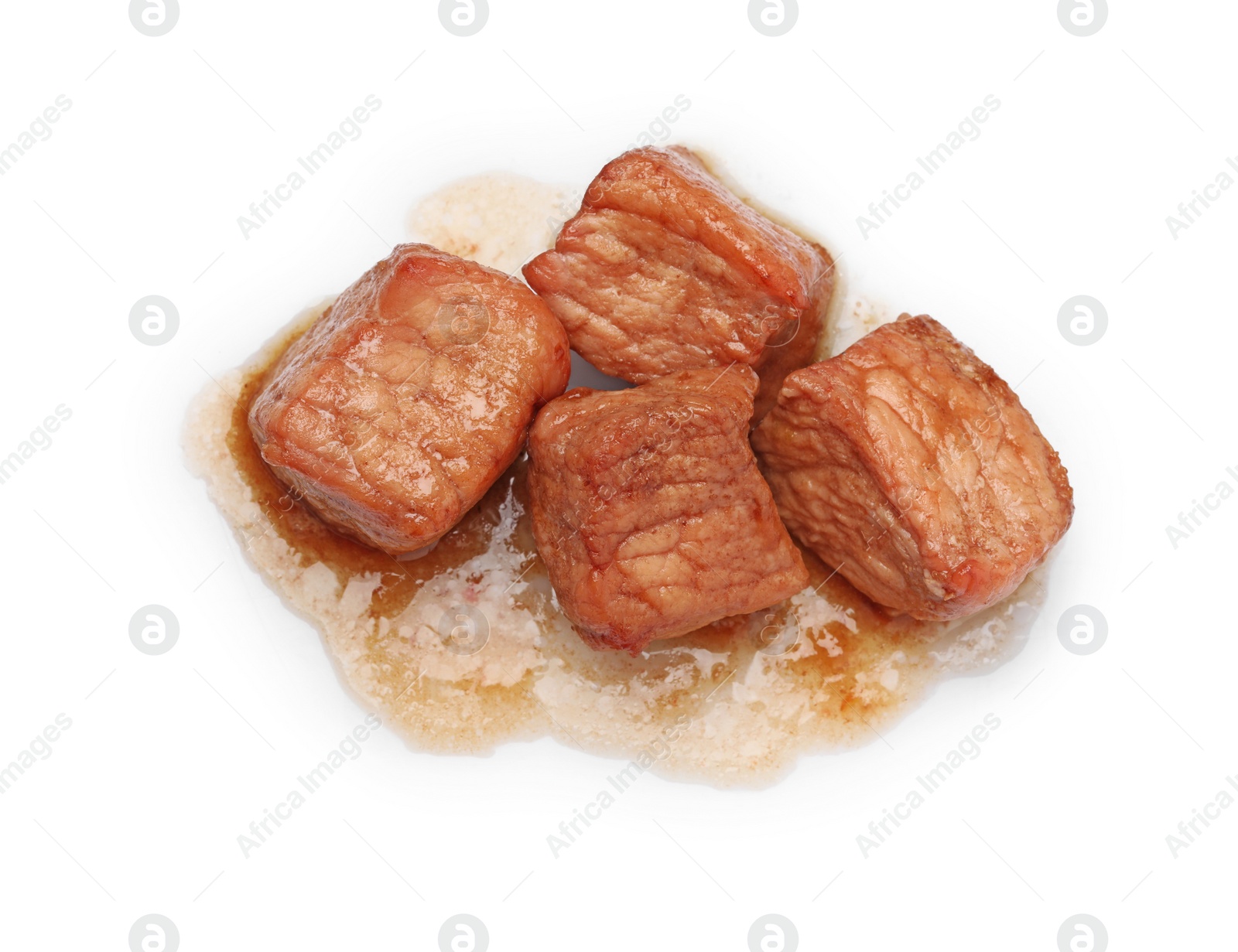 Photo of Pieces of delicious cooked beef isolated on white, top view. Tasty goulash