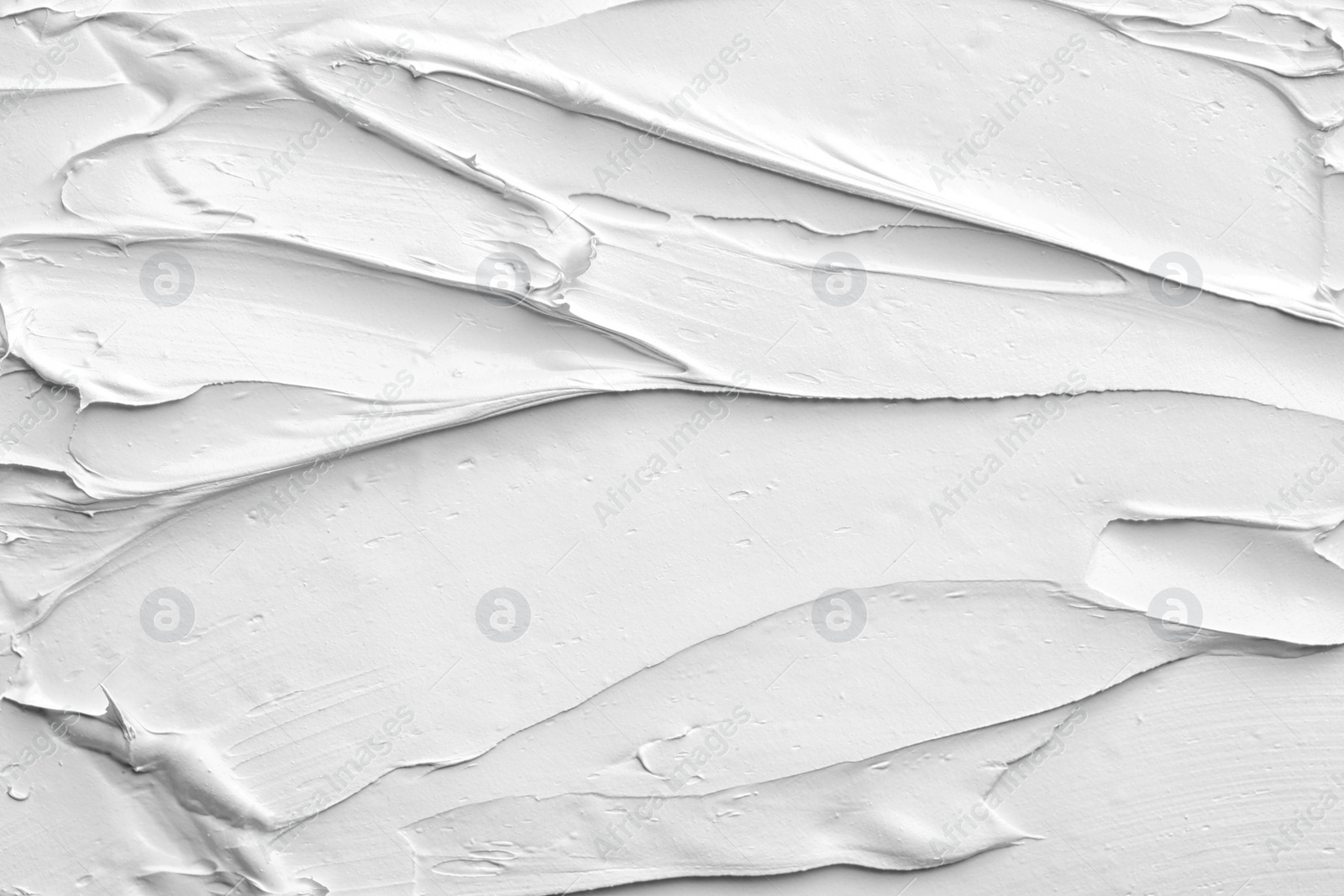 Photo of Bright paint strokes drawn with brush as abstract background