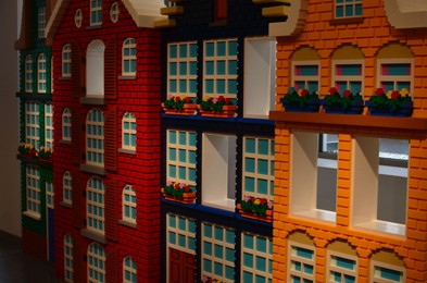 AMSTERDAM, NETHERLANDS - JULY 16, 2022: Buildings made with colorful Lego constructor indoors