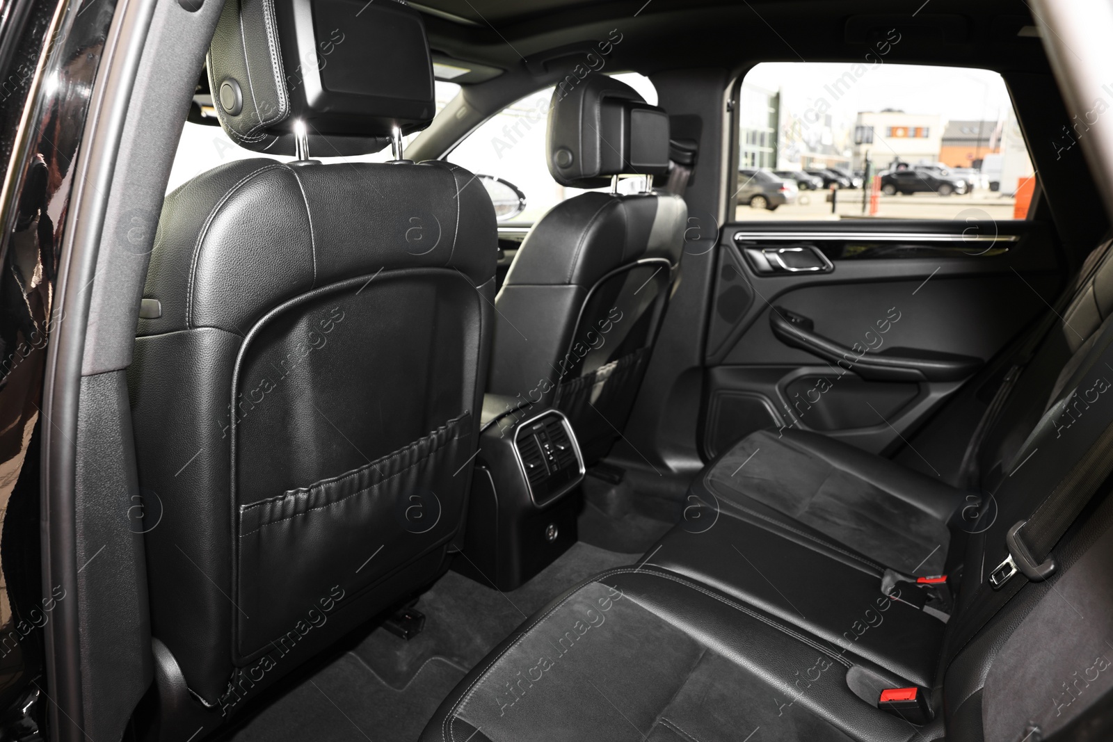 Photo of Inside of modern car with black leather seats