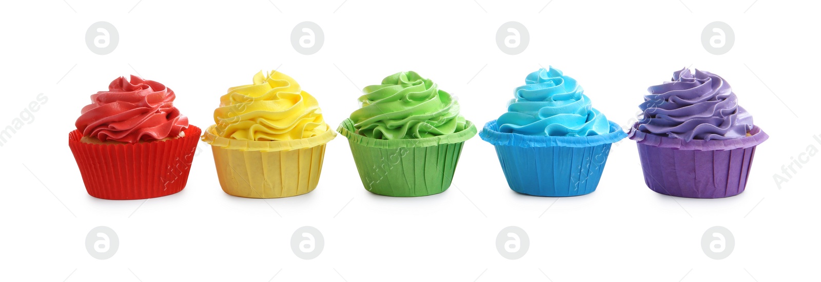 Photo of Tasty cupcakes with bright cream isolated on white