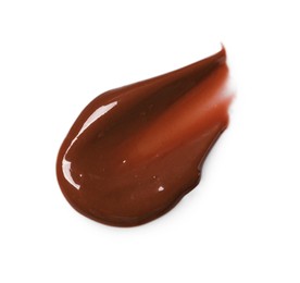 Photo of Smear of tasty melted milk chocolate isolated on white, top view