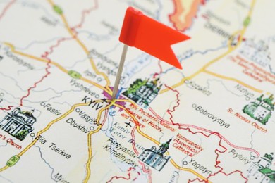 Photo of MYKOLAIV, UKRAINE - NOVEMBER 09, 2020: Kyiv city marked with push pin on map of Ukraine, closeup