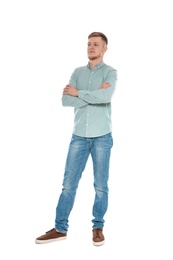 Full length portrait of handsome young man on white background