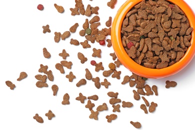 Photo of Bowl with food for cat or dog on white background. Pet care