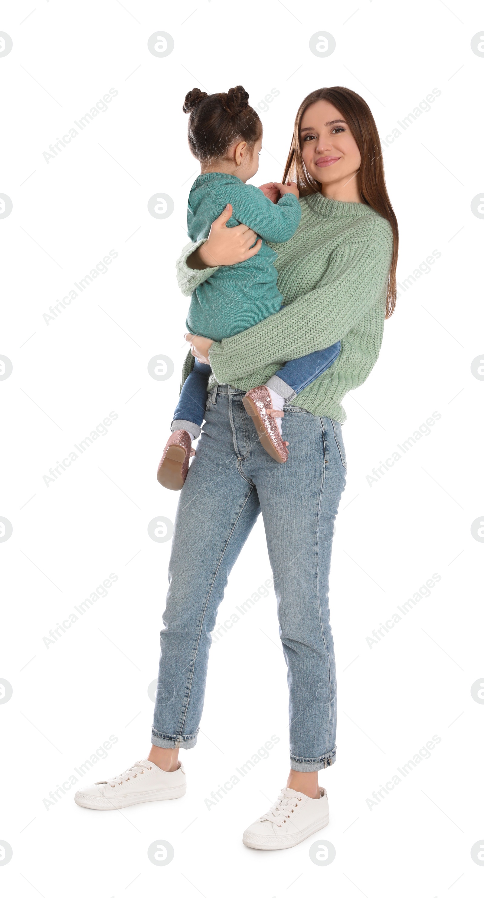 Photo of Young mother with little daughter on white background