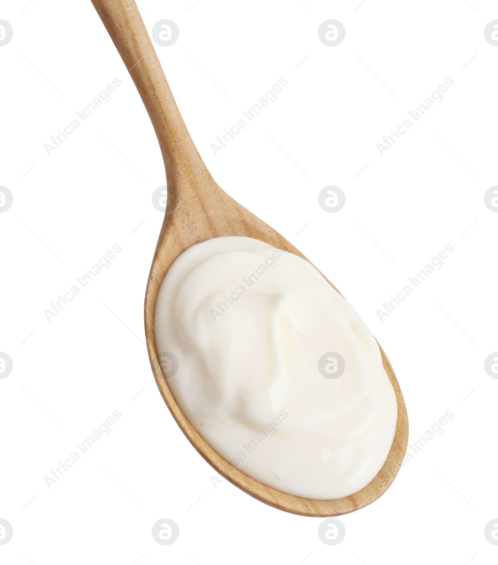 Photo of One wooden spoon with mayonnaise isolated on white