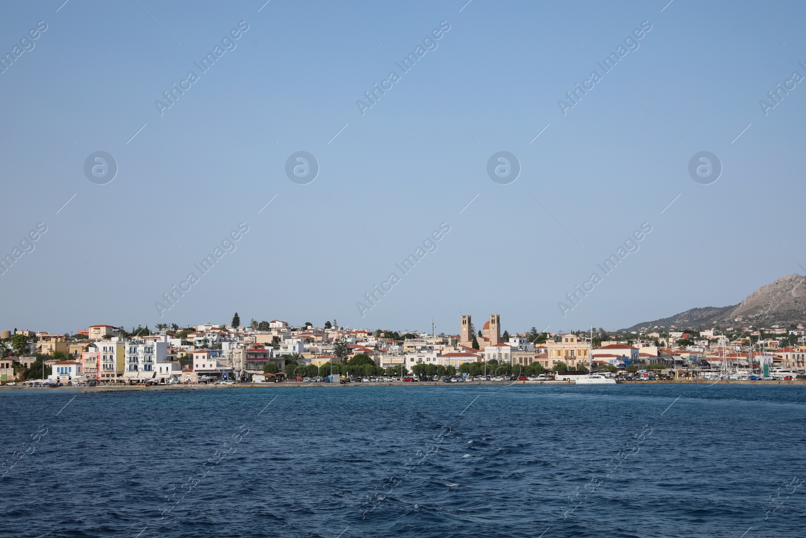 Photo of Beautiful view of sea and coastal city on sunny day