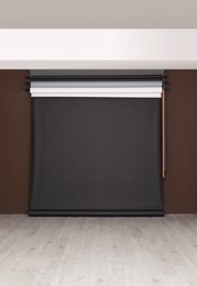 Photo of Empty black photo background. Professional studio equipment