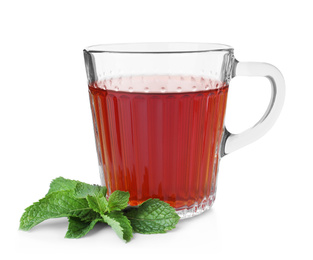 Photo of Cup with hot aromatic mint tea isolated on white