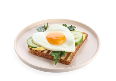 Photo of Plate of tasty sandwich with heart shaped fried egg isolated on white