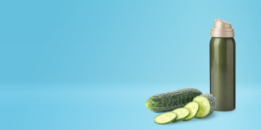 Image of Makeup remover and fresh cucumbers on blue background, banner design. Space for text 