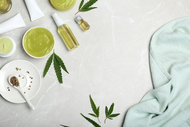 Photo of Flat lay composition with hemp lotion on grey background