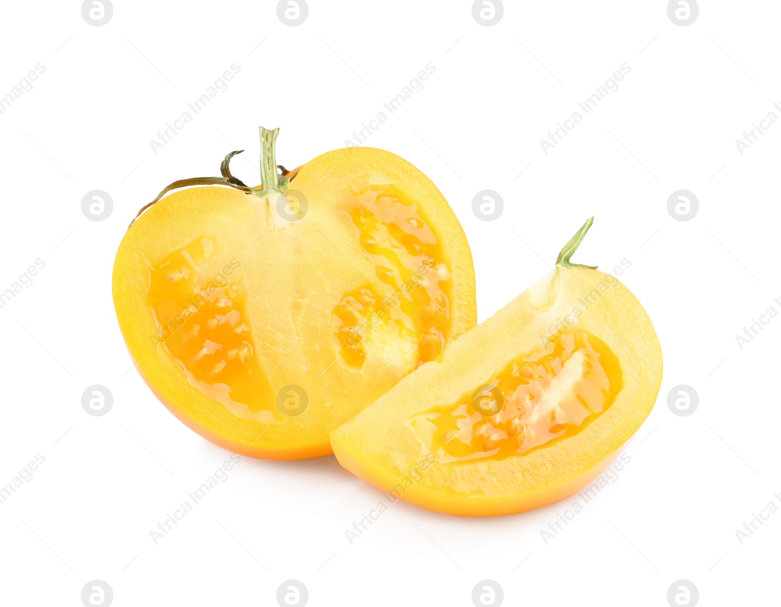 Photo of Cut ripe yellow tomato on white background