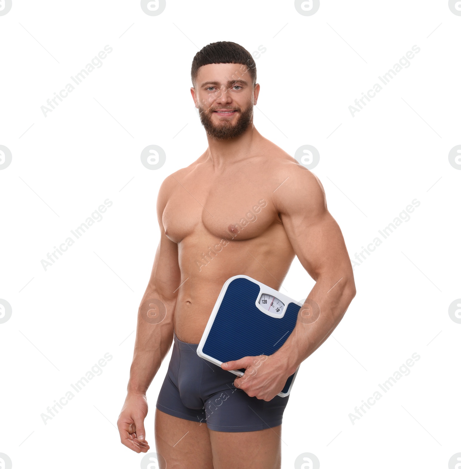 Photo of Portrait of athletic man with scales on white background. Weight loss concept