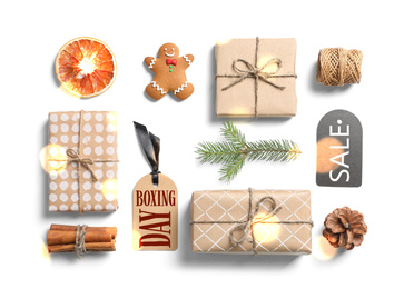 Image of Boxing Day. Flat lay composition with Christmas gifts on white background