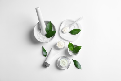 Flat lay composition with cosmetic products on white background