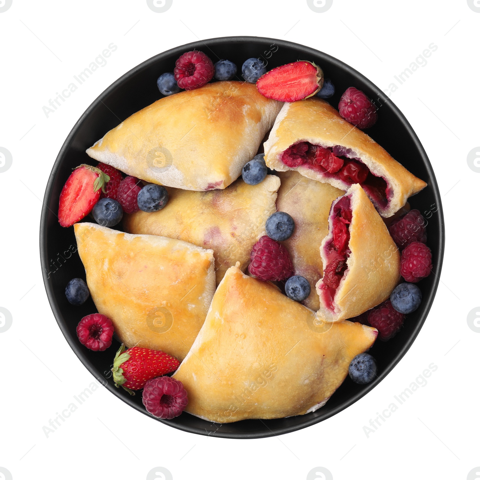 Photo of Bowl with delicious samosas and berries isolated on white, top view