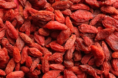 Many dried goji berries as background, closeup. Healthy superfood