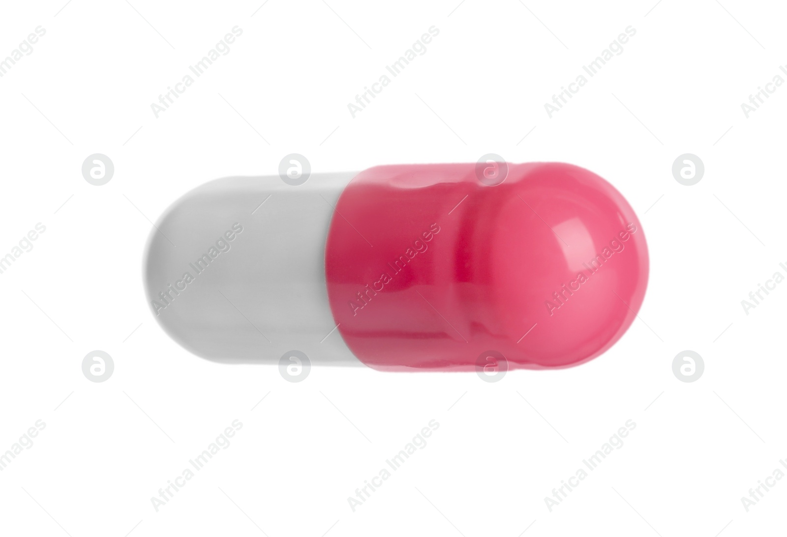 Photo of One pill isolated on white. Medicinal treatment