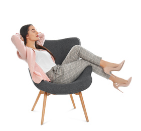 Photo of Young woman resting in armchair on white background