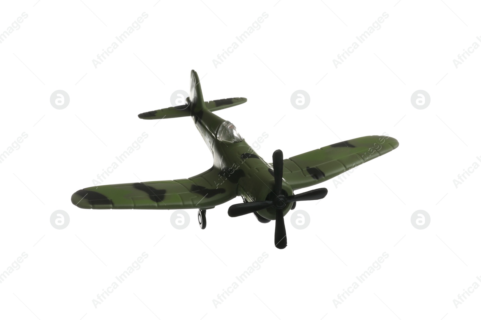 Photo of Vintage toy military airplane on white background