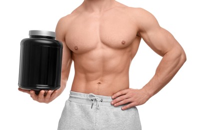 Photo of Young man with muscular body holding jar of protein powder on white background, closeup