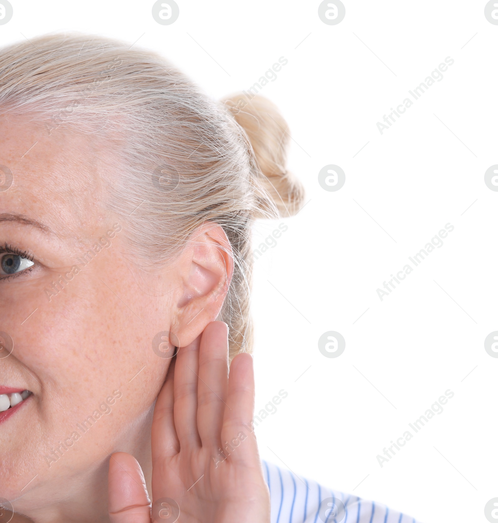 Photo of Mature woman with hearing problem on white background, closeup