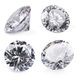 Beautiful dazzling diamonds on white background, set