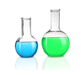 Photo of Laboratory glassware with different samples on white background. Solution chemistry