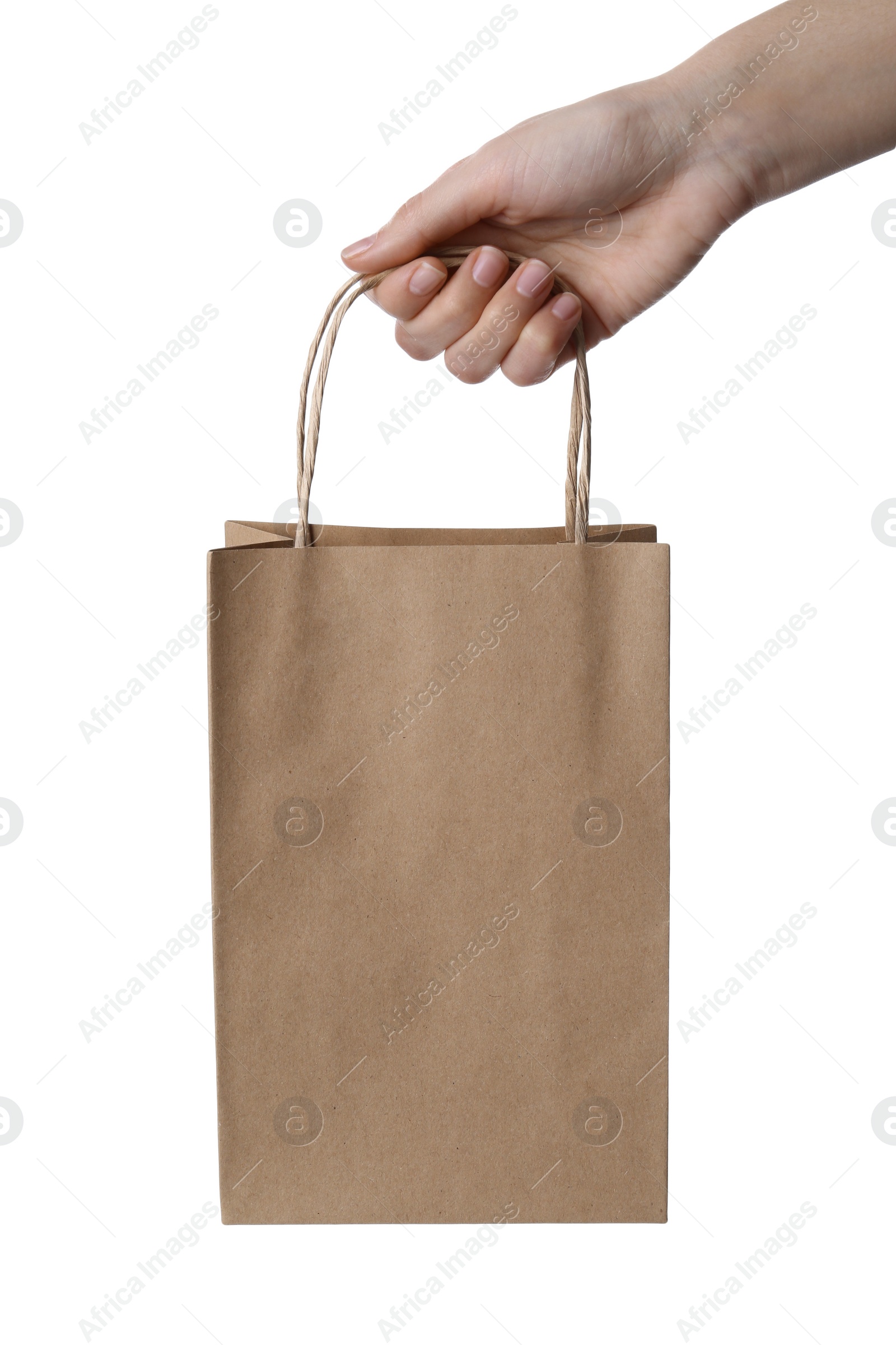 Photo of Woman holding kraft paper bag on white background, closeup. Mockup for design