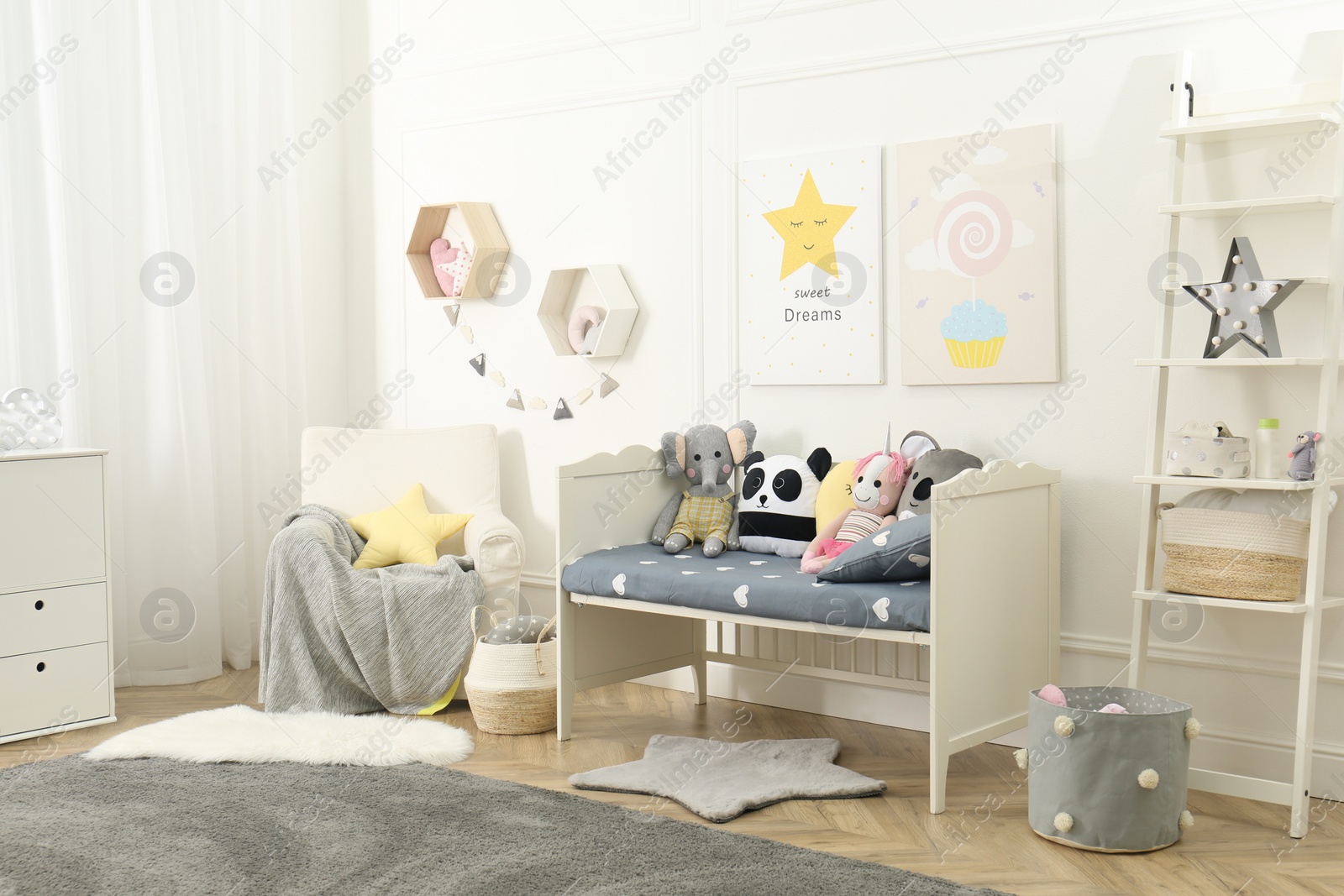 Photo of Child room interior with toys and stylish furniture