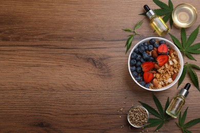 Photo of CBD oil, THC tincture, oatmeal bowl, hemp leaves and seeds on wooden table, flat lay. Space for text