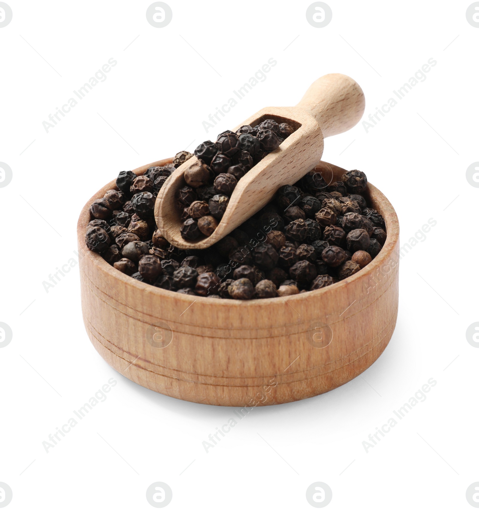 Photo of Aromatic spice. Many black peppercorns in bowl and scoop isolated on white