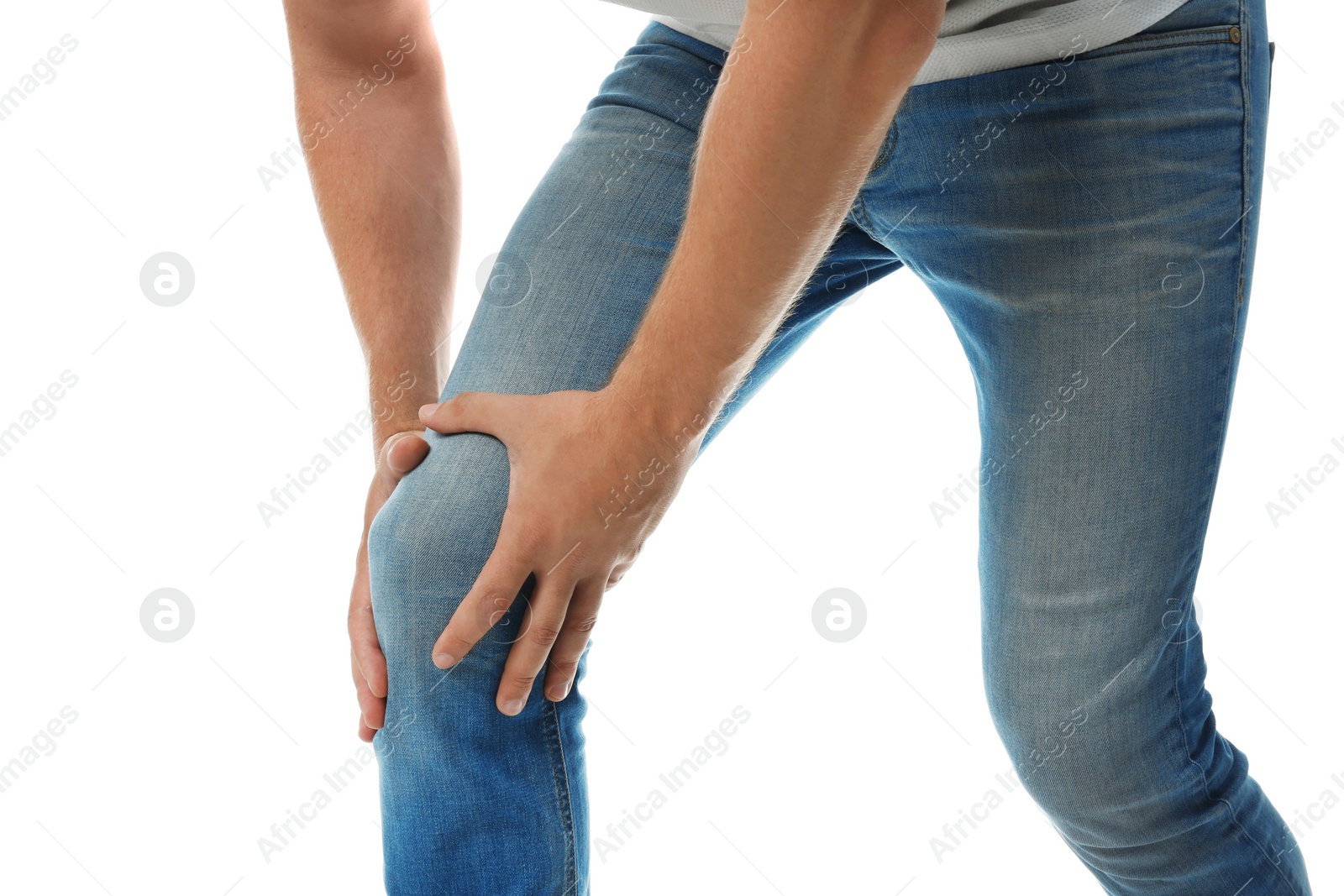 Photo of Man having knee problems on white background, closeup