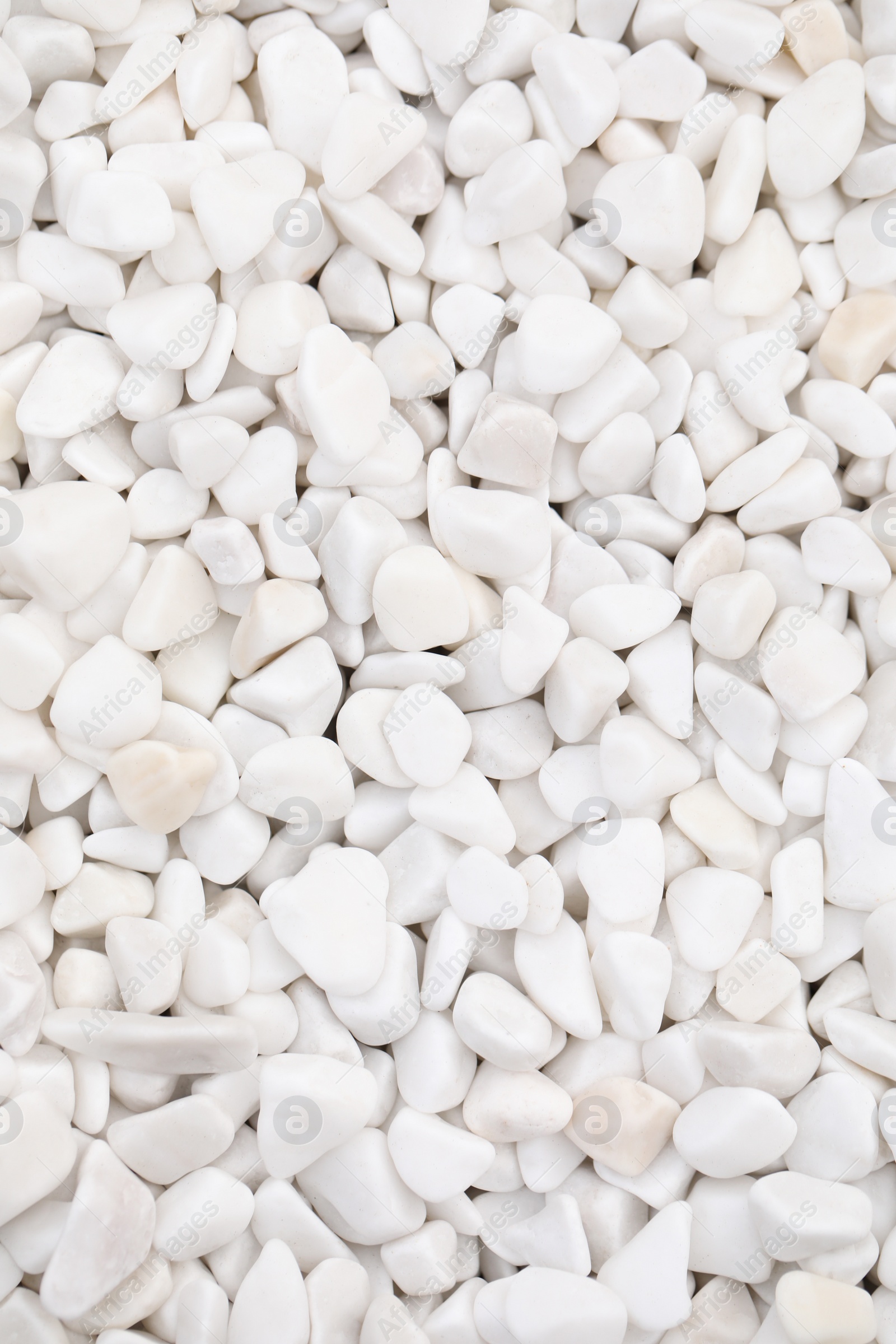 Photo of Beautiful white stones as background, top view