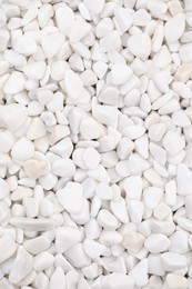 Photo of Beautiful white stones as background, top view