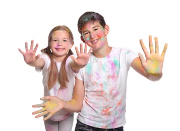 Friends covered with colorful powder dyes on white background. Holi festival celebration
